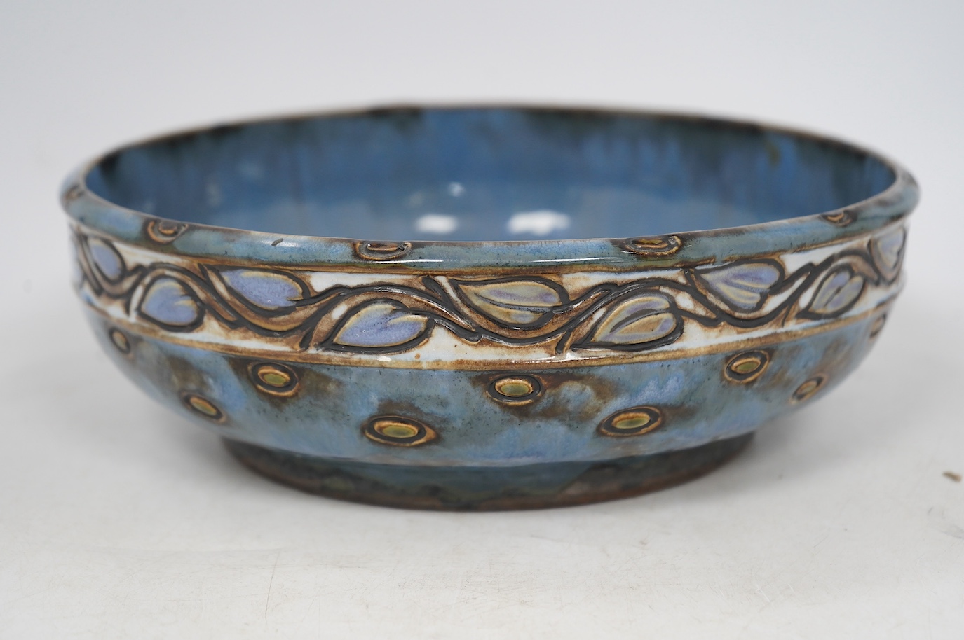 A Royal Doulton blue bowl, designed by Ethel Beard and monogrammed to the base, 25cm diameter. Condition - good